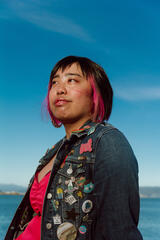 Caryl Loria Illana by the ocean, looking into the distance Caryl Loria Illana by the ocean, looking into the distance