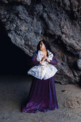 Caryl as the ocean goddess Maguayan, holding a shell to heart, looking aside Caryl as the ocean goddess Maguayan, holding a shell to heart, looking aside